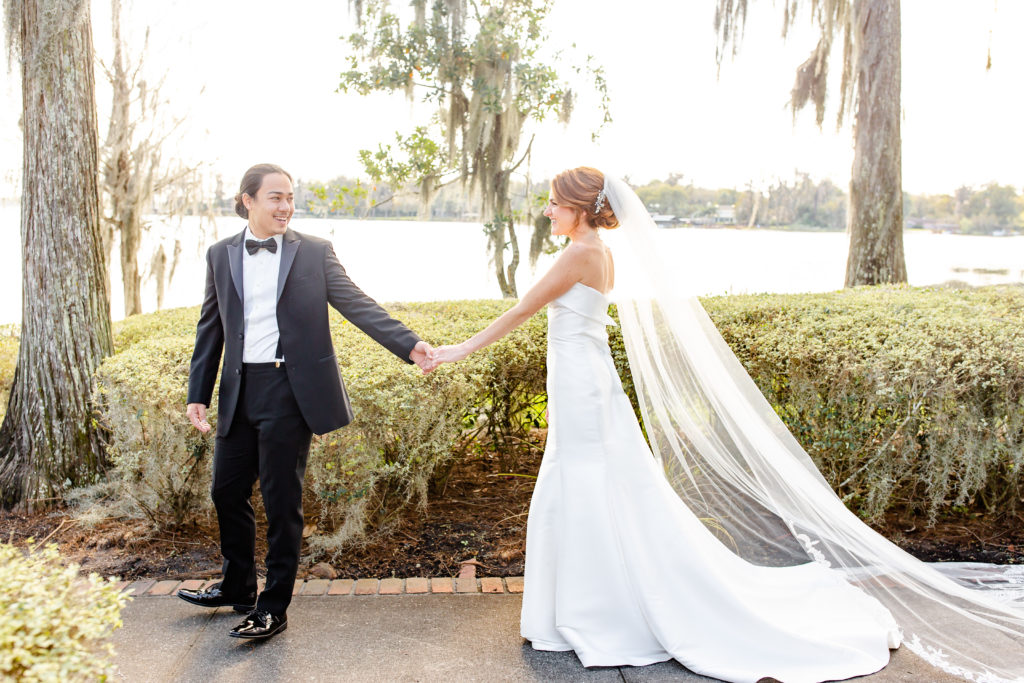 Cypress Grove Estate House Wedding Couple Photos With Groom Holding Bride's Hand