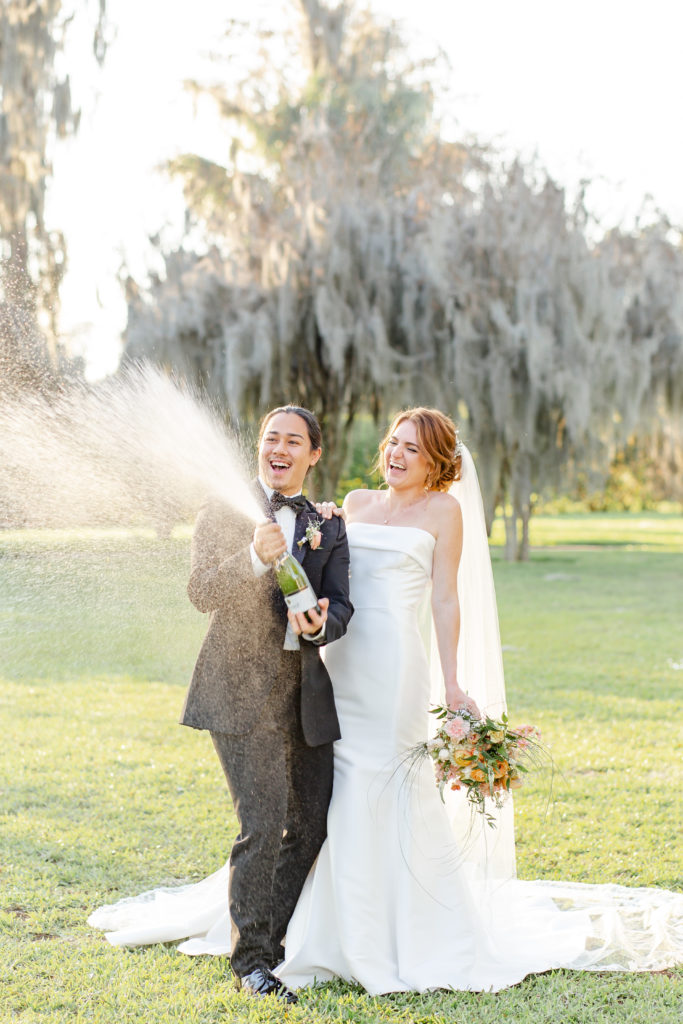 Champagne pop at Cypress Grove Estate House Wedding