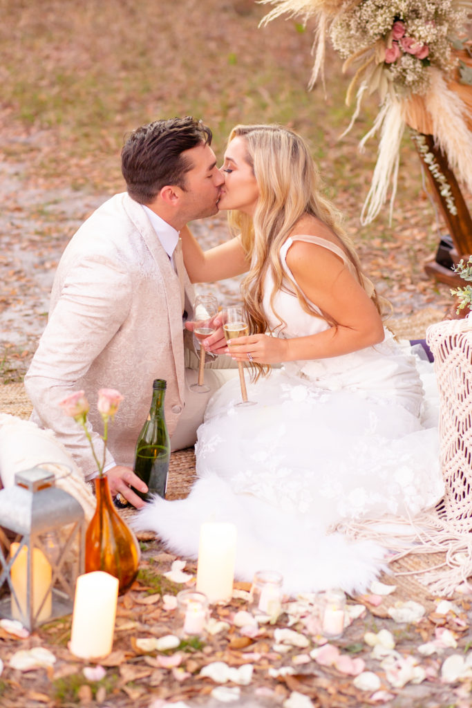 Boho elopement picnic with champagne