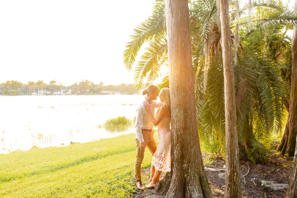 Engagement photos with palm trees in Florida