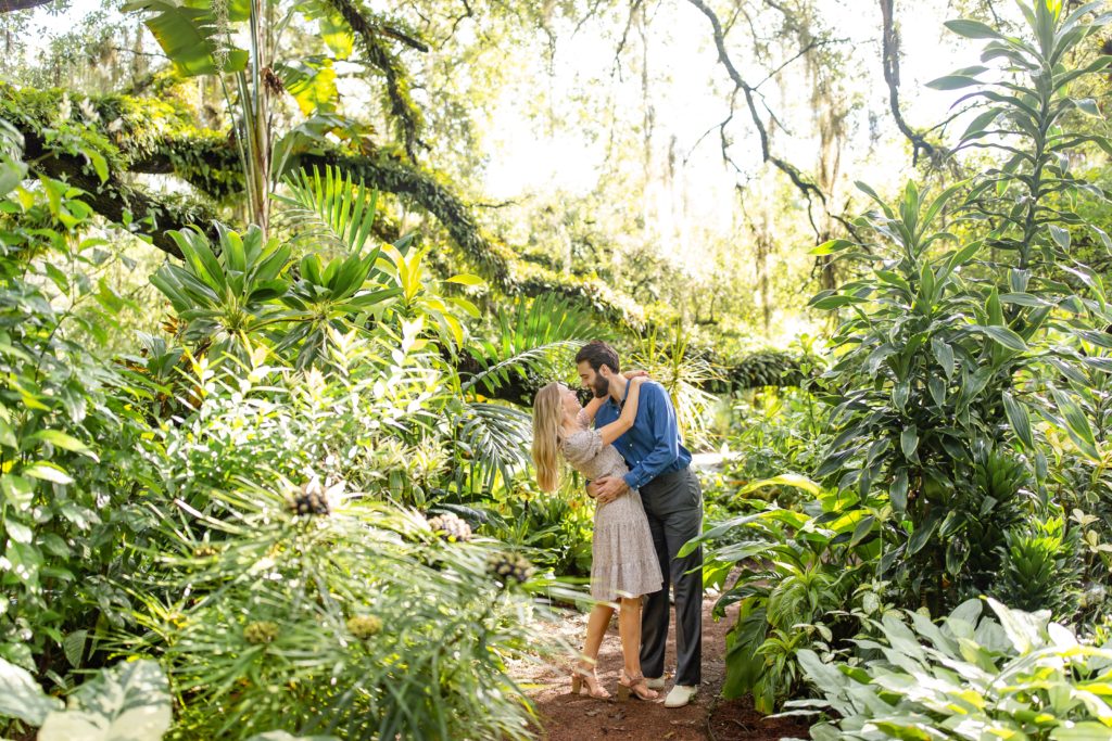 Leu Gardens Engagement Photos in Orlando, FL — Guy dipping girl in botanical garden