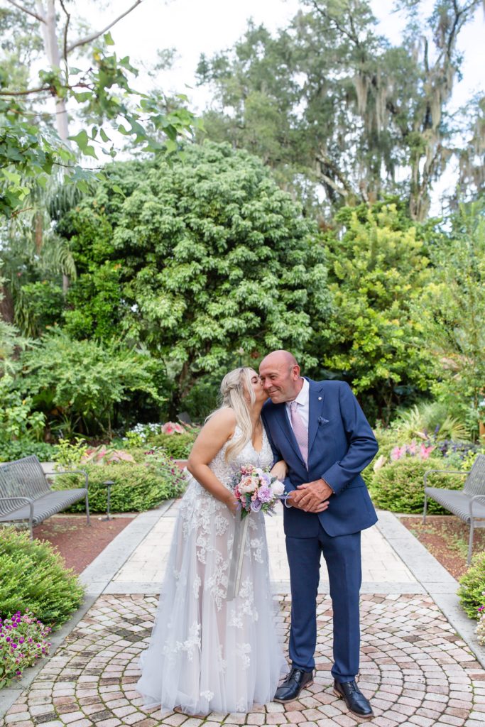 Leu Gardens Wedding Photos in Orlando, FL — Bride giving father kiss before walking down the aisle