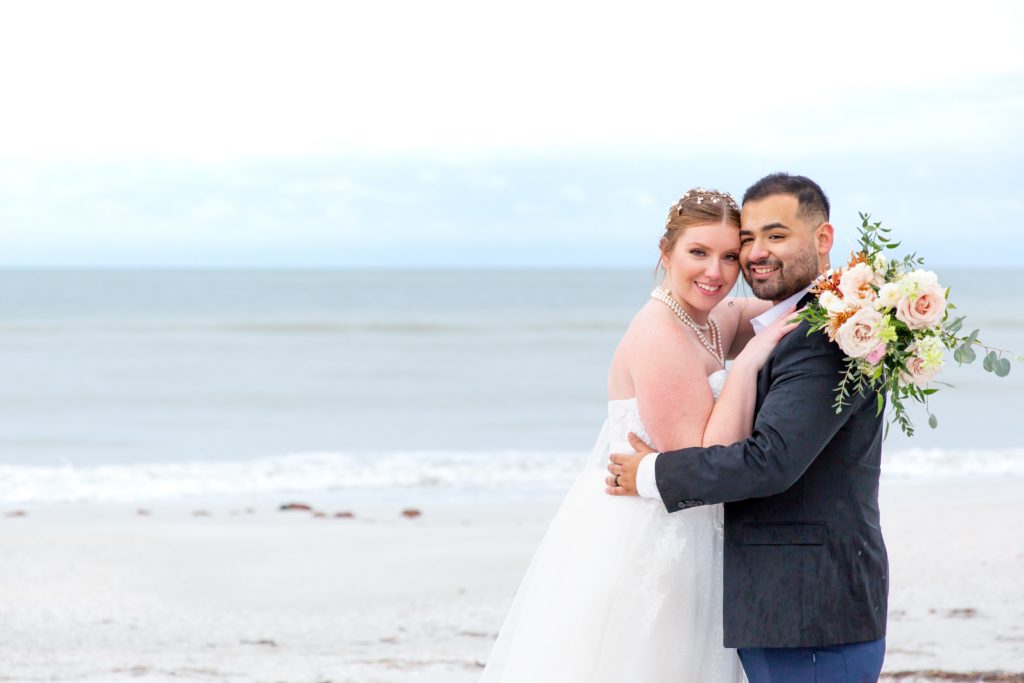 Bride and Groom on beach after Treasure Island Elopement