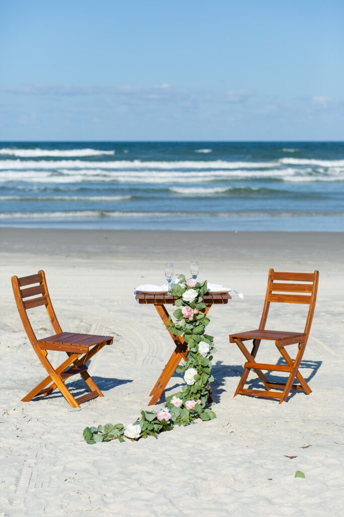 Table for Two with Floral Garland and romantic dinner in Florida Beach Wedding Packages