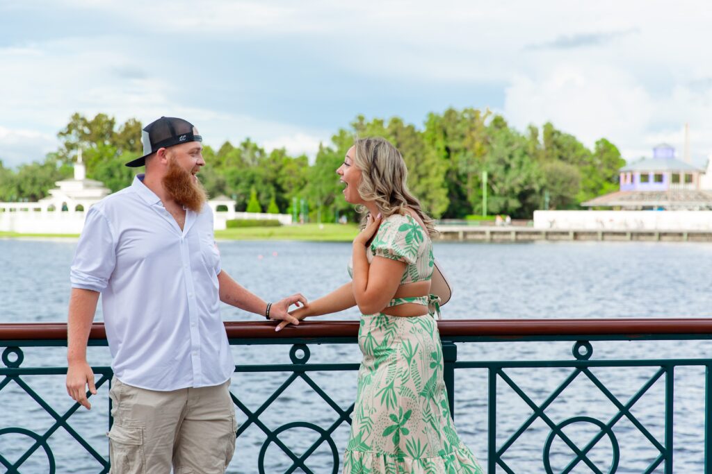 Girl shocked after Disney Proposal at the Boardwalk in front of the water