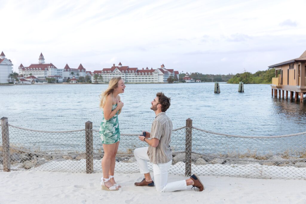 Guy proposes to girl on the beach at Disney's Polynesian Resort in Orlando, Florida