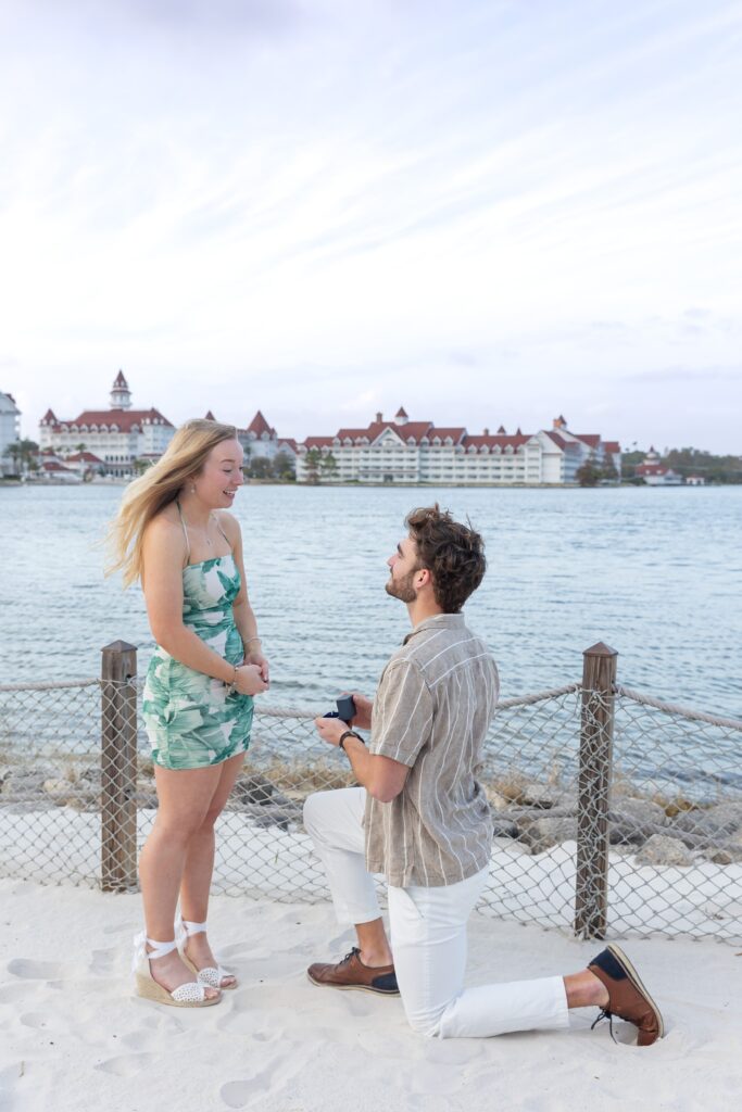 Guy proposes to girl on the beach at Disney's Polynesian Resort in Orlando, Florida