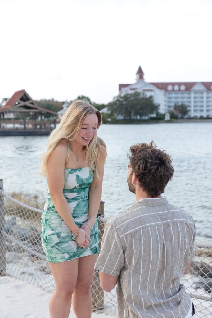 Guy proposes to girl on the beach at Disney's Polynesian Resort in Orlando, Florida