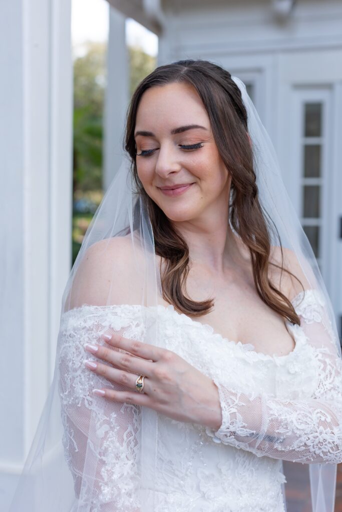 Bride has sweet smile after her micro wedding at Cypress Grove Estate House in Orlando, Florida