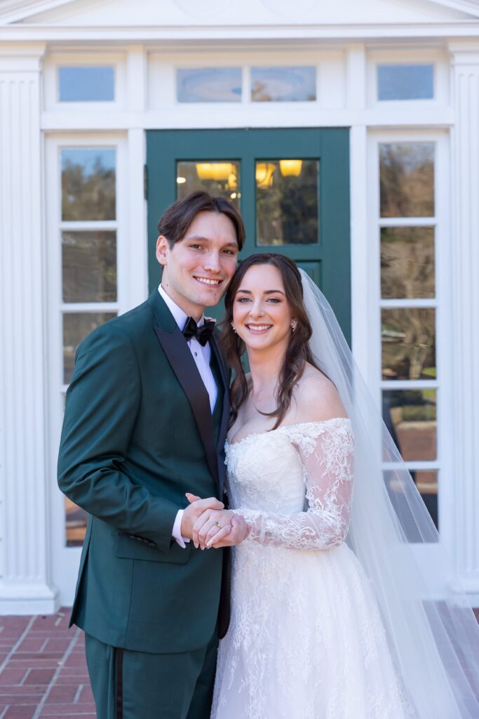 Bride and Groom pose for micro wedding at Cypress Grove Estate House in Orlando, Florida