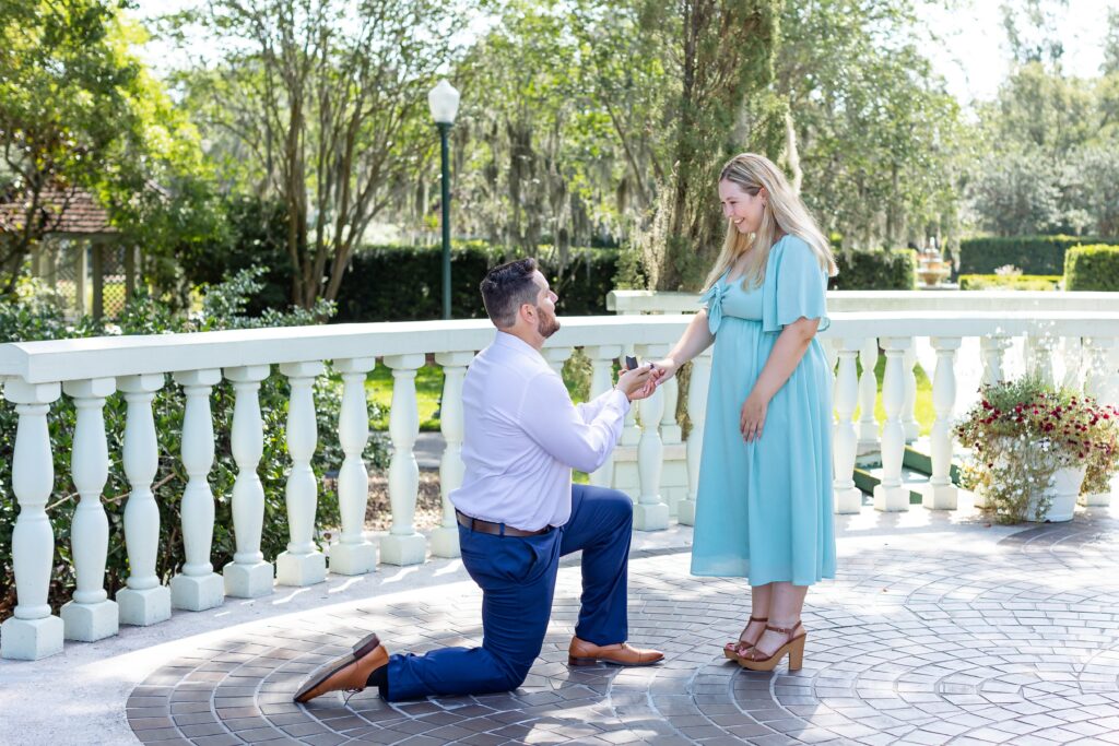 Guy gets down on one knee to propose to girlfriend for their Proposal at Leu Gardens in Orlando Florida