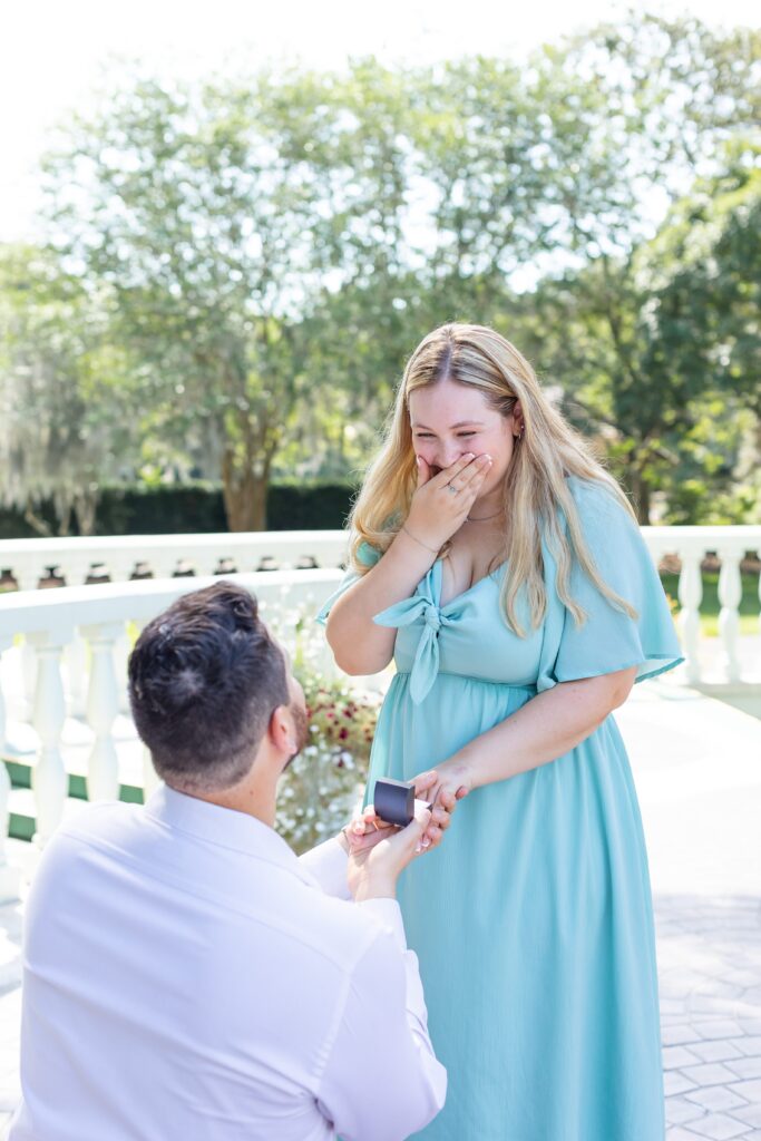 Guy gets down on one knee to propose to girlfriend for their Proposal at Leu Gardens in Orlando Florida