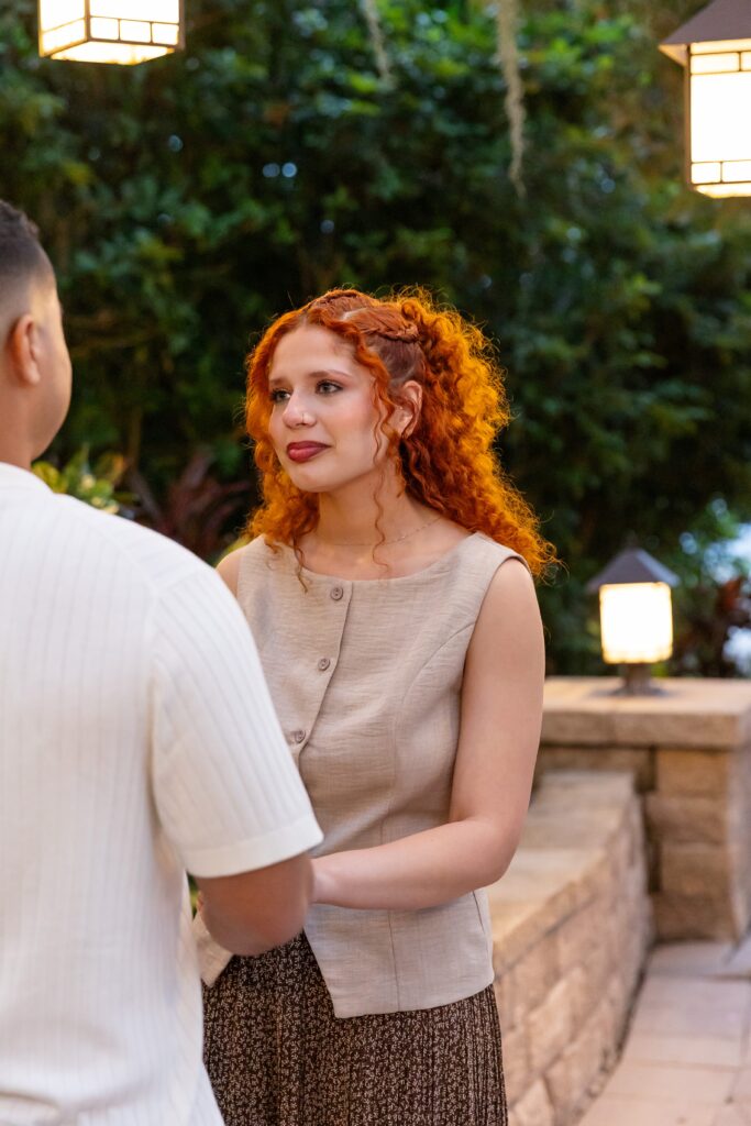 Girl gets emotional during proposal at the Hyatt Regency Grand Cypress Resort Orlando Oak Terrace