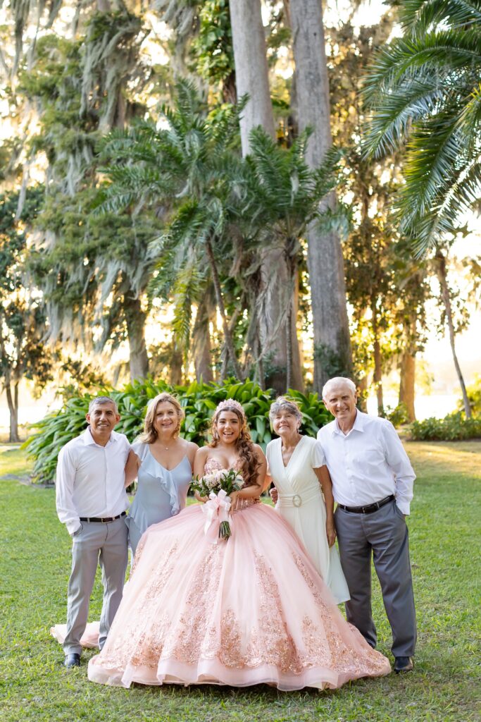 Parents and Grandparents pose for Quinceañera in Orlando at Kraft Azalea Gardens