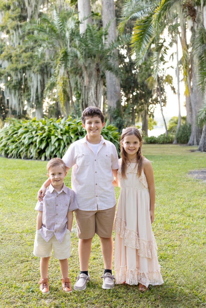 Kids smile for their Kraft Azalea Gardens Family Photo Session in Winter Park, Florida